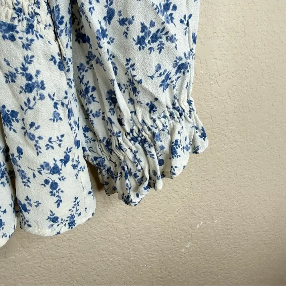 REFORMATION Braelyn Top Blue White Smocked Floral Pull On Spring Women’s Sz L